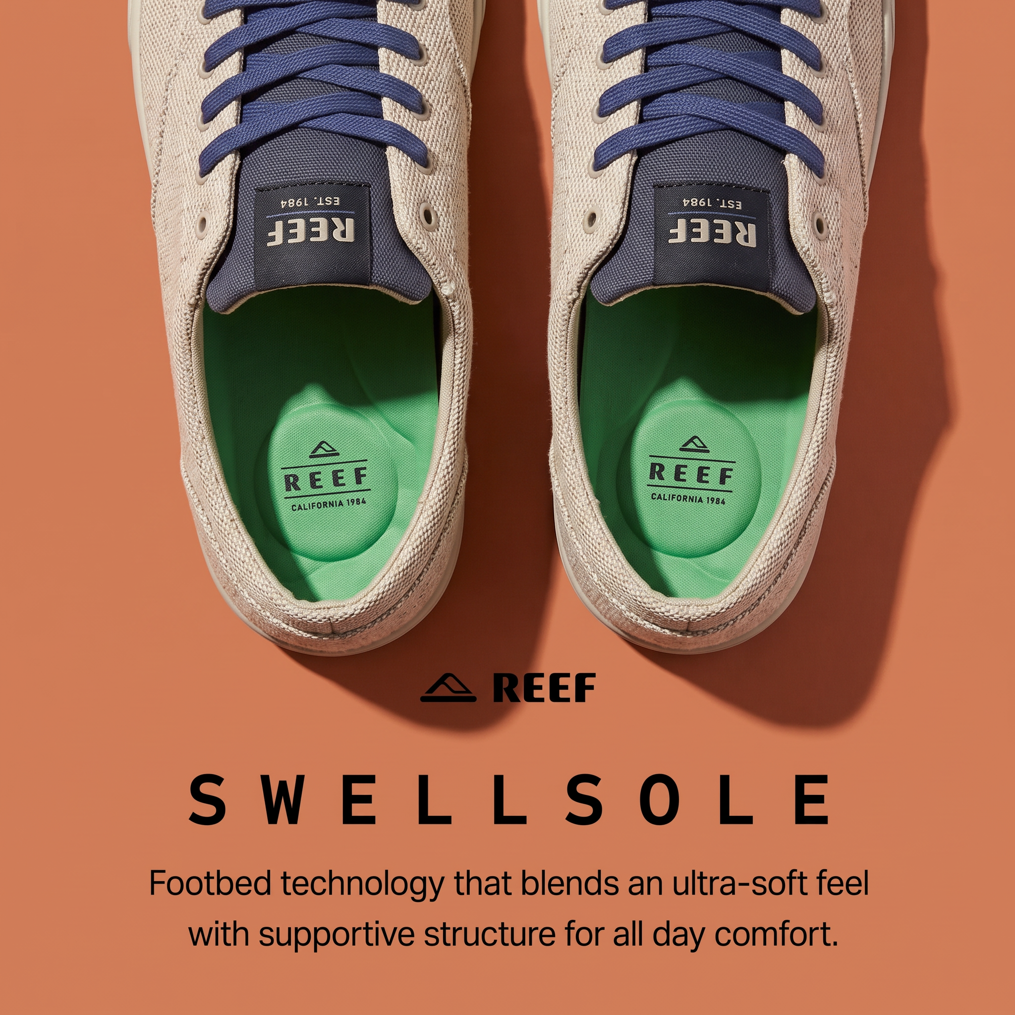 Top-down view of two beige Reef sneakers with navy laces and bright green Swellsole insoles on a terracotta background.