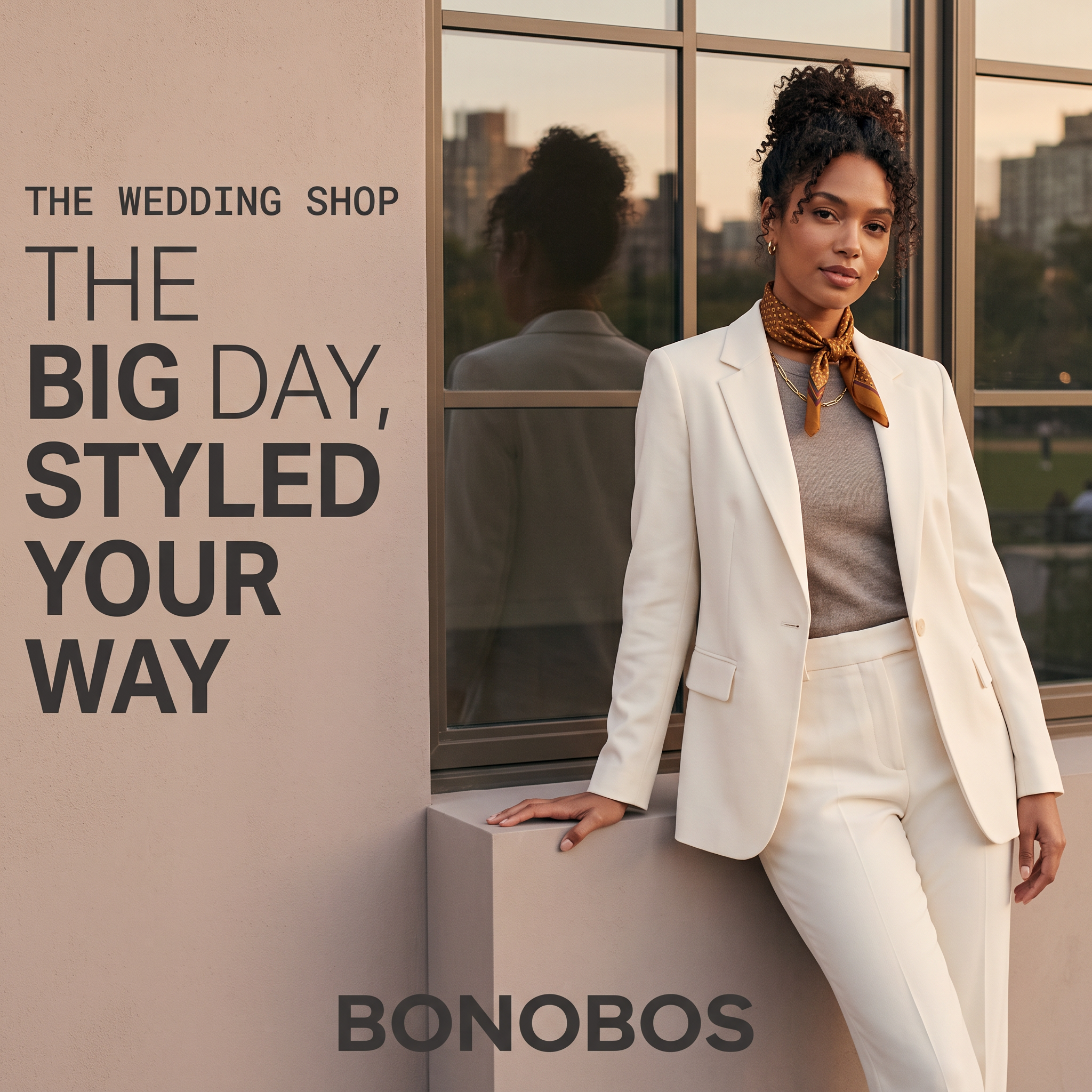 Woman in a cream suit and silk scarf leaning by a city window at sunset, with The Big Day Styled Your Way headline
