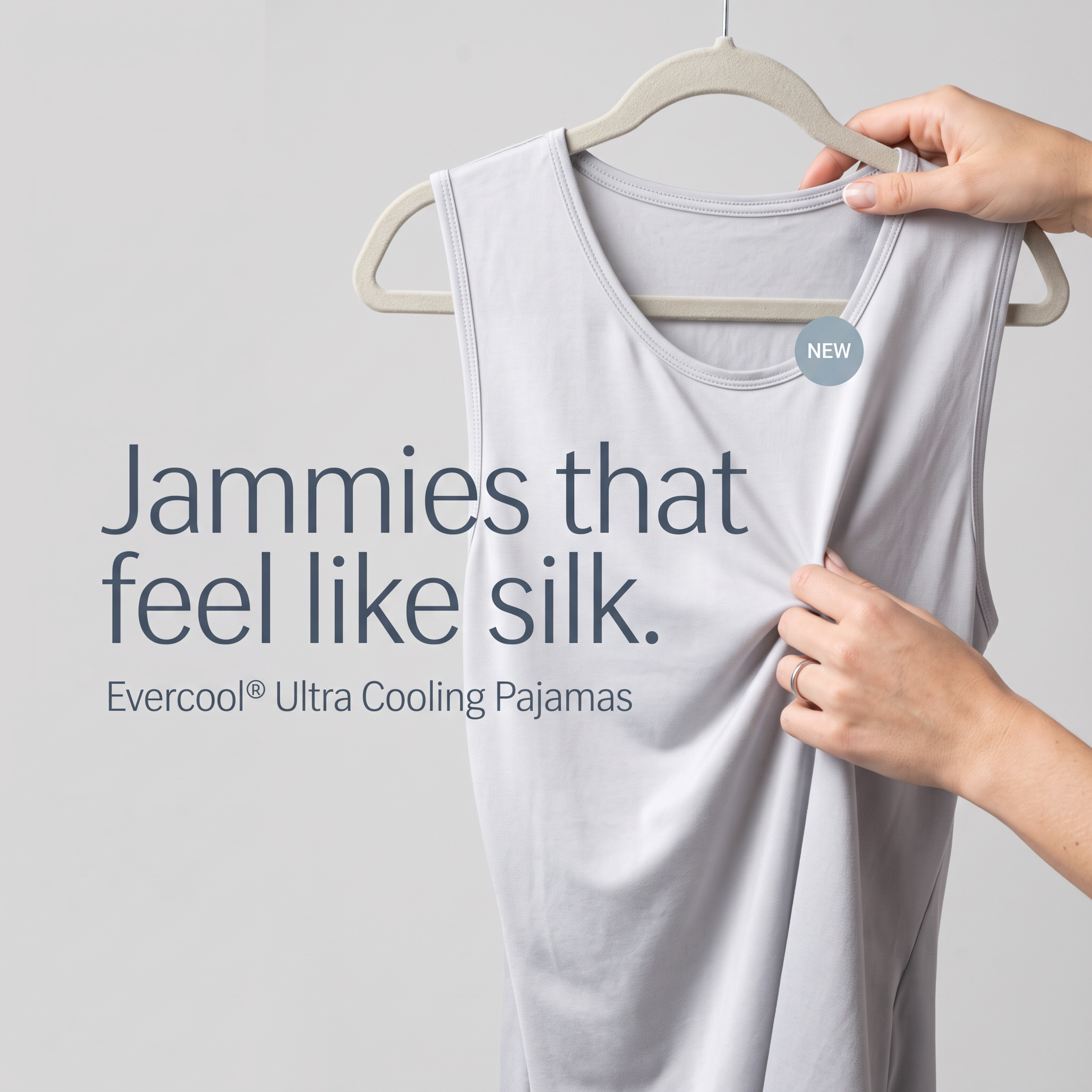 Hands stretching a light grey pajama top on a hanger, with the headline jammies that feel like silk