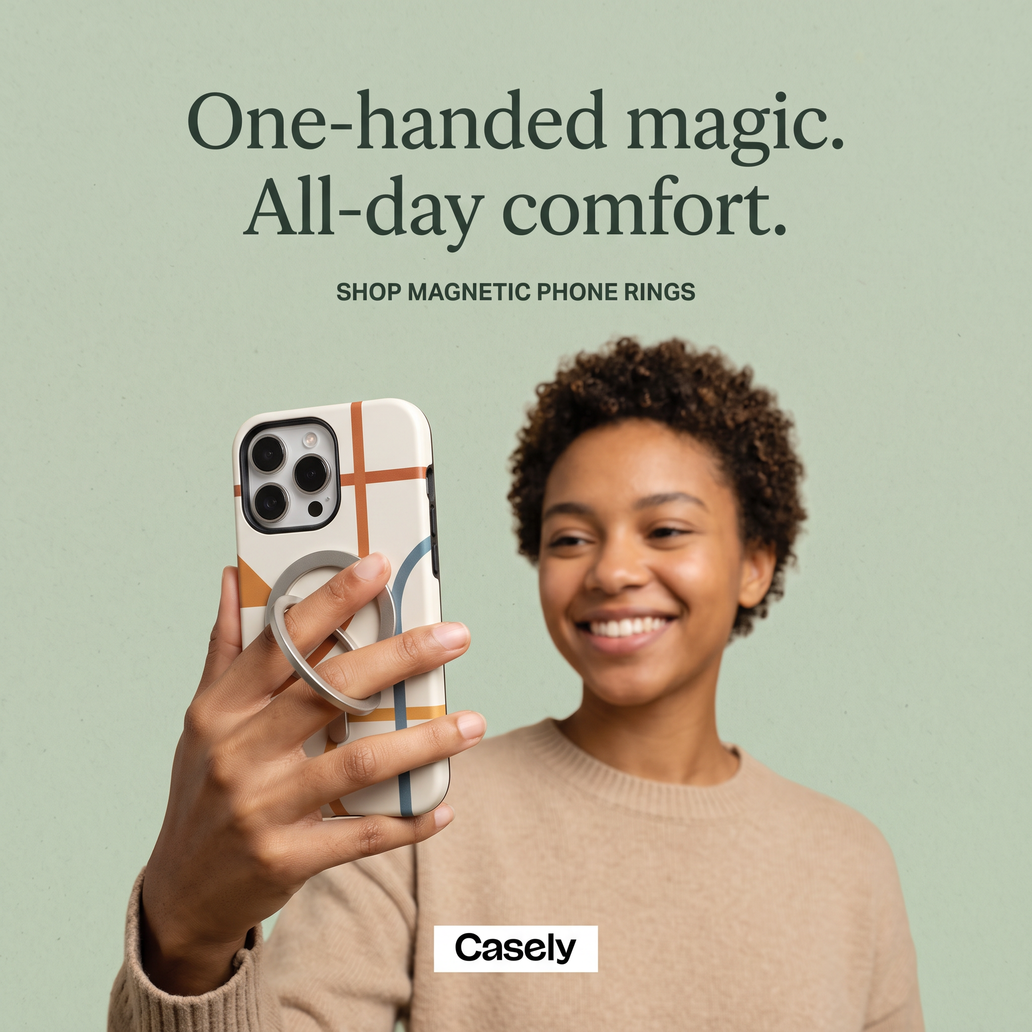 Smiling woman holding a patterned phone case with a silver magnetic ring on her finger, One-handed magic headline