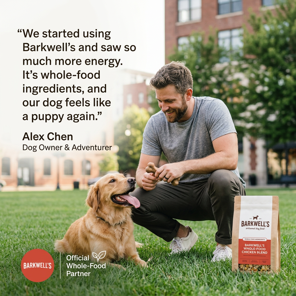 Smiling man crouching with a golden retriever on grass in a city park beside a Barkwell's whole-food chicken blend bag
