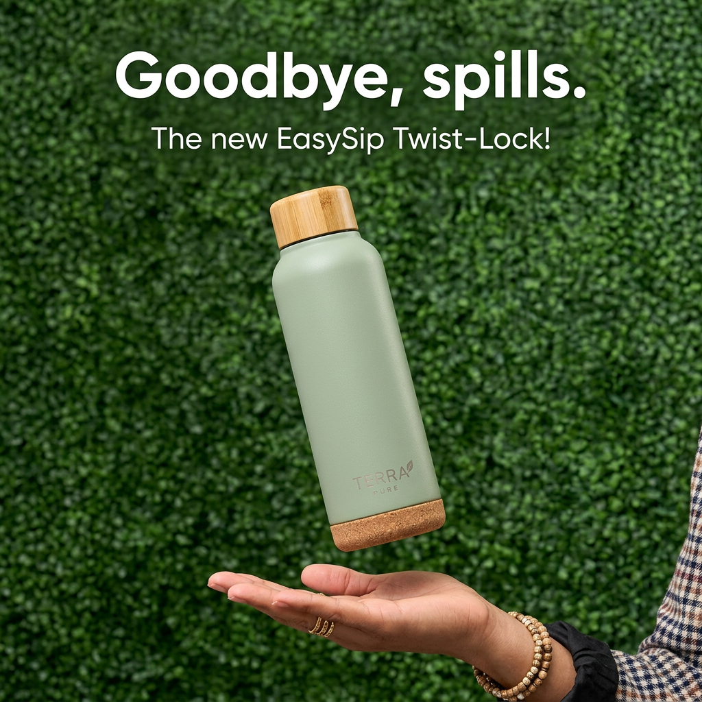 Sage water bottle with a bamboo cap and cork base floating above an open hand, against a green hedge wall