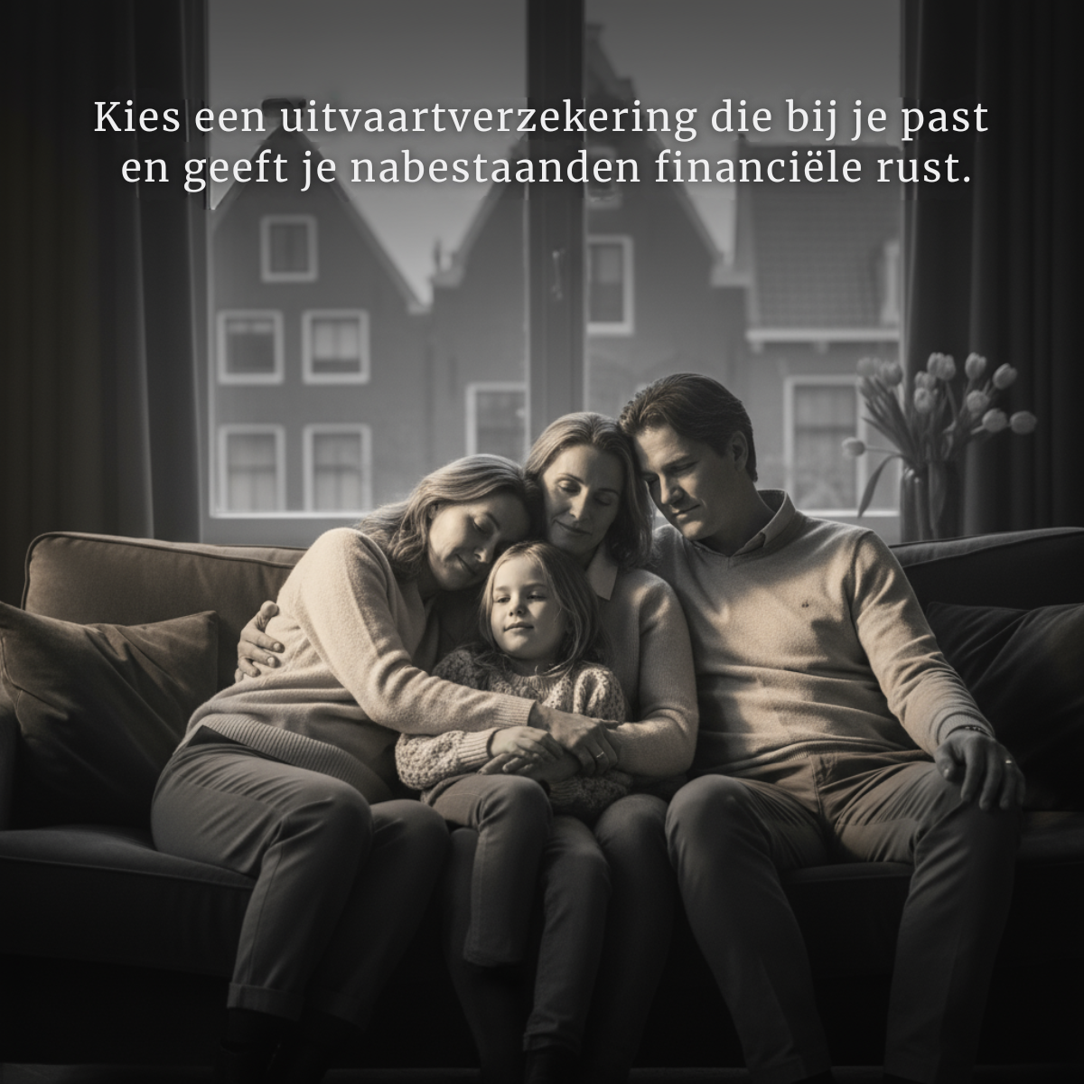 Dark sepia photo of two women, a man and a young girl embracing on a sofa in front of a window with Dutch gabled houses.