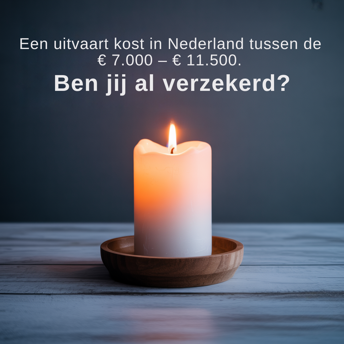 Single lit white pillar candle on a wooden tray on a grey table against a dark wall with white Dutch cost text above