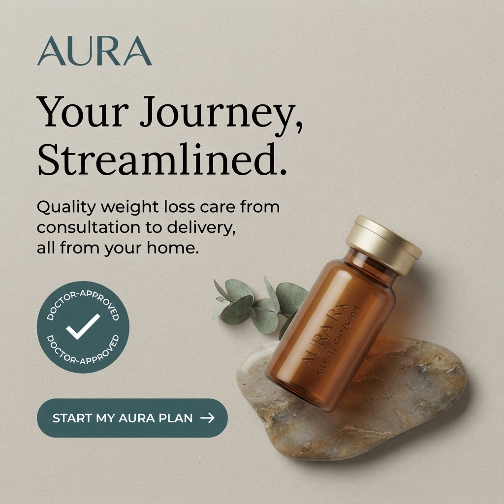 Amber Aura Rx GLP-1 GIP blend vial lying on a polished stone with eucalyptus leaves beside a doctor-approved badge