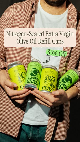 Man in red checked shirt holding four Graza Sizzle and Drizzle olive oil refill cans with a 35% off sticker