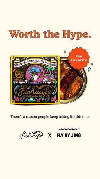 Fishwife x Fly By Jing smoked salmon box beside an open tin of glazed salmon with a Fan Favorite badge on cream