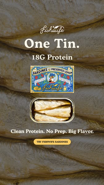 Fishwife sardines box and open tin of sardines on a silver sardine-skin texture with '18G Protein' headline