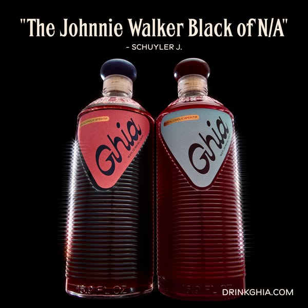 Two Ghia non-alcoholic apéritif bottles with pink and blue labels on black background under a customer quote headline