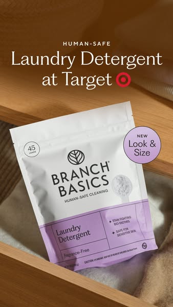 Branch Basics Laundry Detergent pouch in a wooden drawer with linens, headline Laundry Detergent at Target, New Look badge