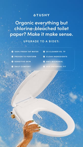 Hand holding a TUSHY bidet seat against a blue sky below a frosted card listing eight benefits in two columns