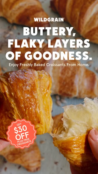 Two hands tearing glossy croissants apart over more croissants, with bold white headline and a coral $30 off badge