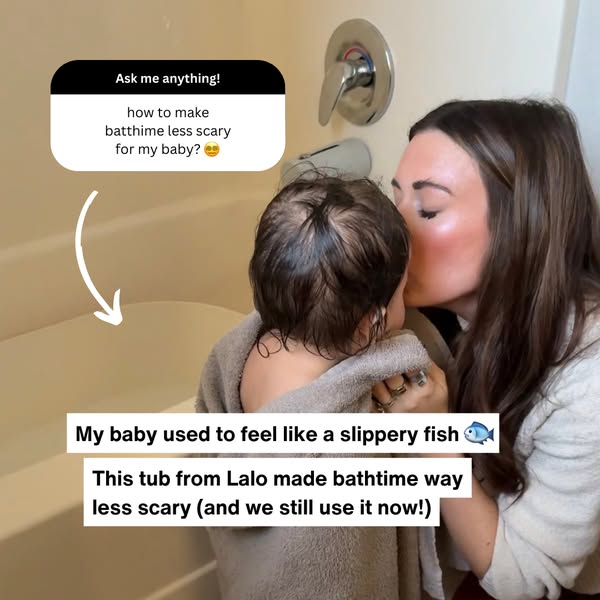 Mother kissing her toddler wrapped in a grey towel by a bathtub, with an Ask me anything sticker about bath time