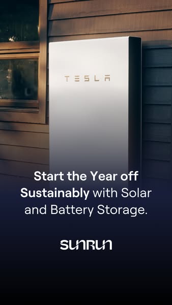 Tesla Powerwall on a dark wooden house wall by a window in sunset light, with a New Year sustainability message