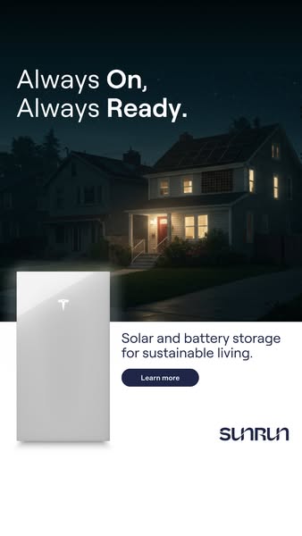 House with solar panels and a glowing porch light at night above a white panel with a Tesla Powerwall and Learn more button