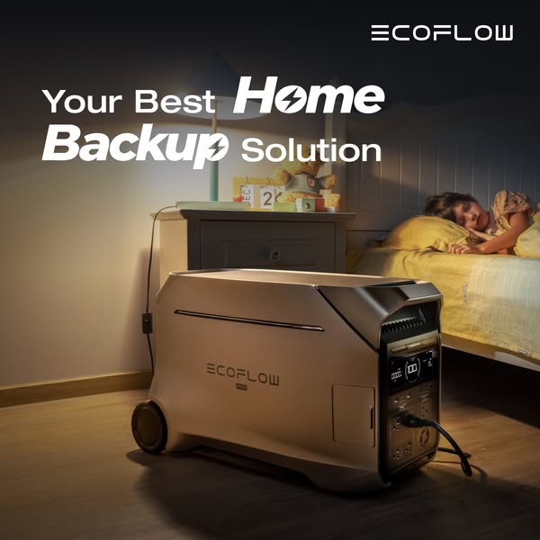 EcoFlow portable power station on a wooden floor powering a bedside lamp while a child sleeps in a dimly lit bedroom