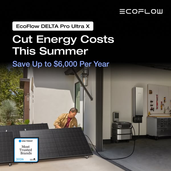 Man setting up solar panels outside a sunny garage where an EcoFlow DELTA Pro Ultra X battery is connected to a wall panel