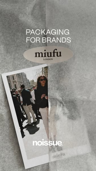 Noissue ad: an oval miufu London sticker sealing translucent grey tissue paper, with a branded street-style polaroid…