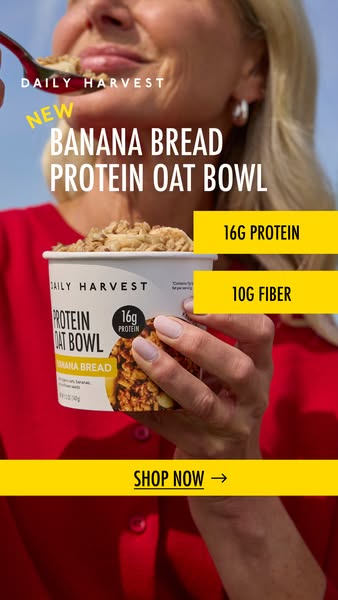 Woman in red top holding a Daily Harvest Banana Bread Protein Oat Bowl and spoon, with yellow 16g protein and 10g fiber tags