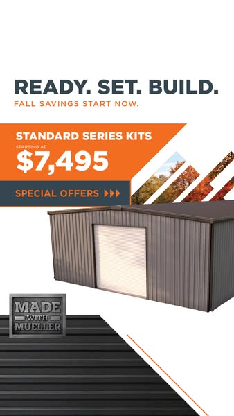 Grey metal building with white roll-up door under text Ready. Set. Build. Standard Series Kits starting at $7,495