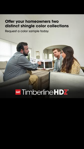 Contractor in a living room showing shingle color samples to a young couple, with GAF Timberline HDZ logo below