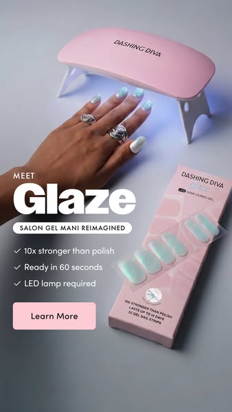 Dashing Diva Glaze ad showing a hand with aqua chrome Glaze nails curing under a pink Dashing Diva mini LED lamp, the...