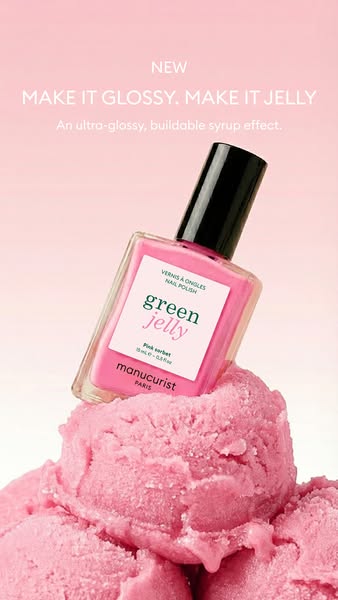 Bottle of Manucurist Green Jelly Pink Sorbet nail polish resting on scoops of pink ice cream against a pink background