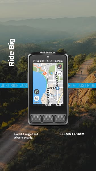 Wahoo ELEMNT ROAM GPS computer showing a map, placed over a gravel road in green hills with Ride Big text