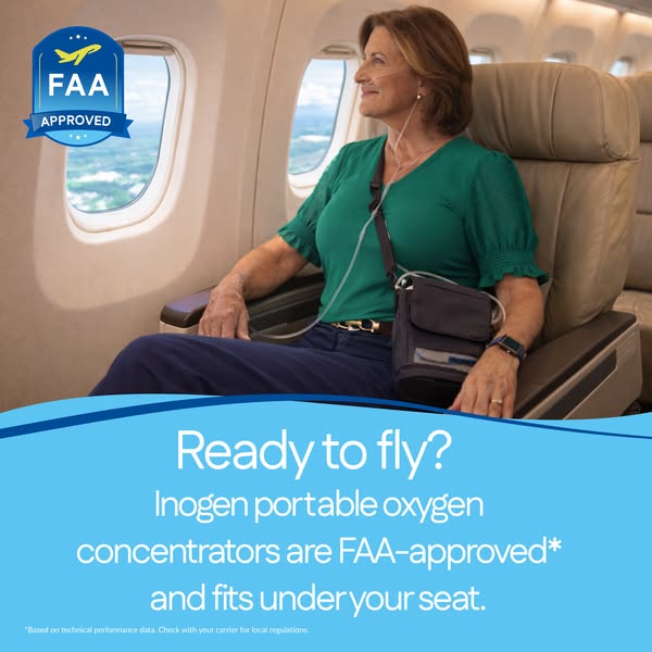 Woman sits in an airplane seat by the window wearing an Inogen portable oxygen concentrator, FAA Approved badge top left