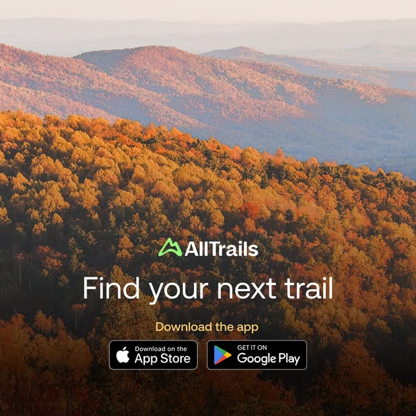 AllTrails square ad: autumn forested hills at golden hour with 'Find your next trail' and App Store and Google Play badges