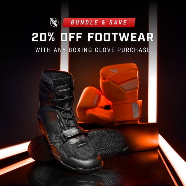 Black Hayabusa boxing shoe in front of orange boxing gloves under neon light with 20% off footwear bundle offer text